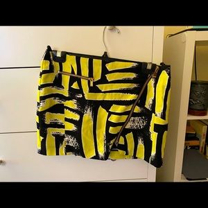Black and yellow mini skirt
